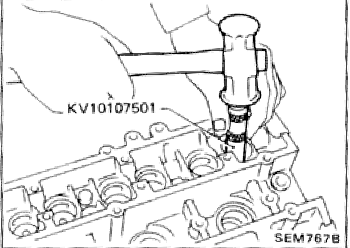 Tool KV10107501 being used to install valve oil seal in place