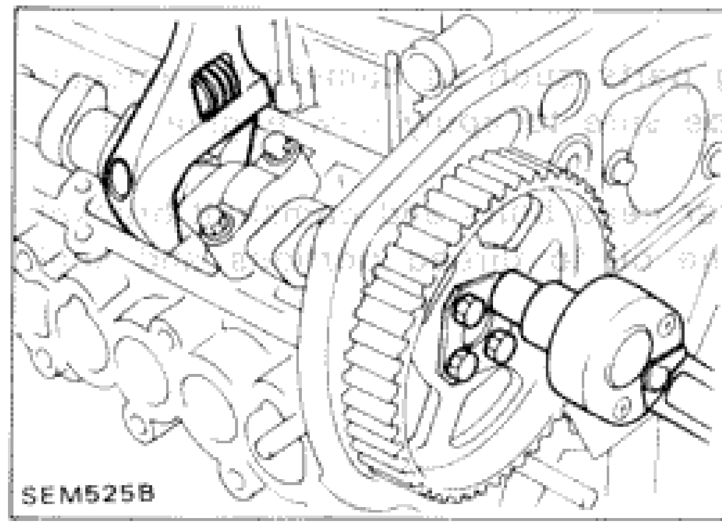 Photograph showing camshaft sprocket area at front of cylinder head, illustrating removal of intake manifold and camshaft sprockets