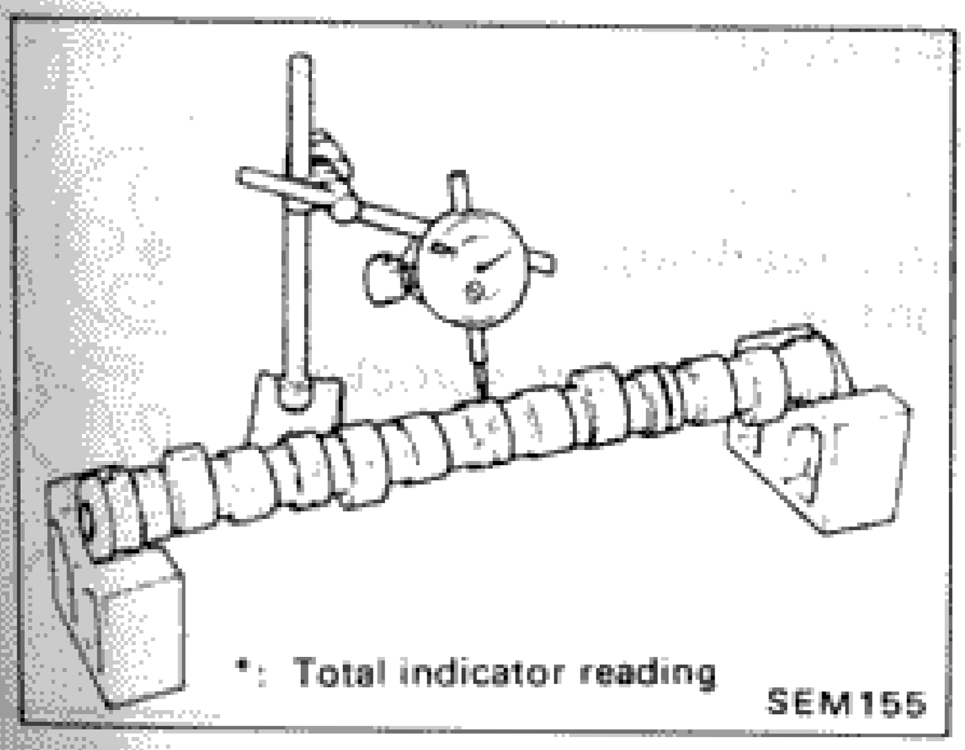 Illustration of camshaft runout measurement at center journal using dial indicator (total indicator reading)