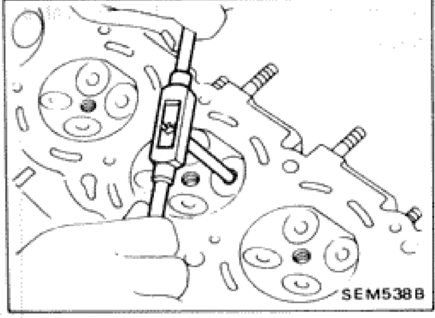 Reaming cylinder head valve guide hole with reamer tool