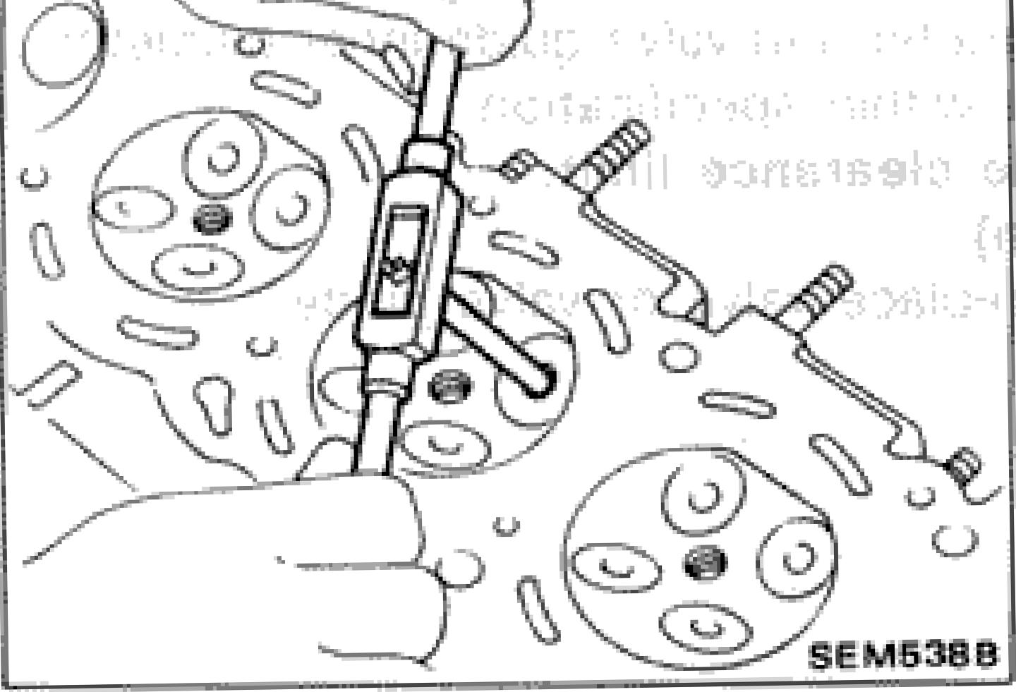 Illustration showing reaming of valve guide in cylinder head