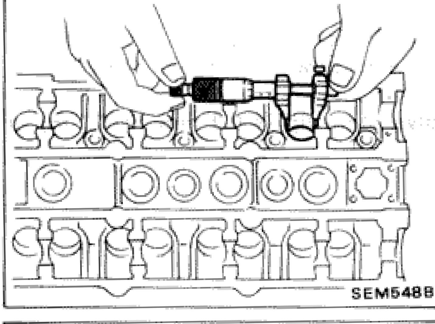 Dial gauge/bore gauge being used to measure valve lifter guide inner diameter in cylinder head
