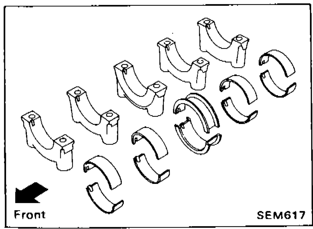 Main bearing halves laid out showing front orientation
