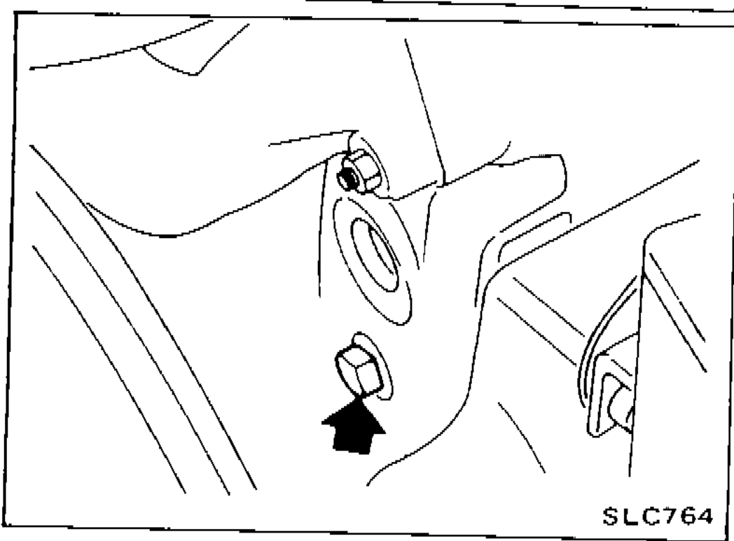 Photo showing location of cylinder block drain plug at left rear of cylinder block, with arrow indicating the plug.