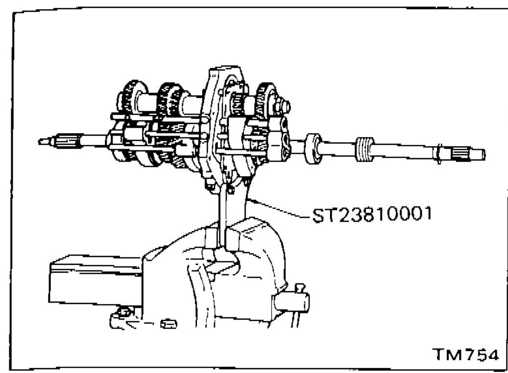 Tool ST23810001 set up on adapter plate on transmission assembly