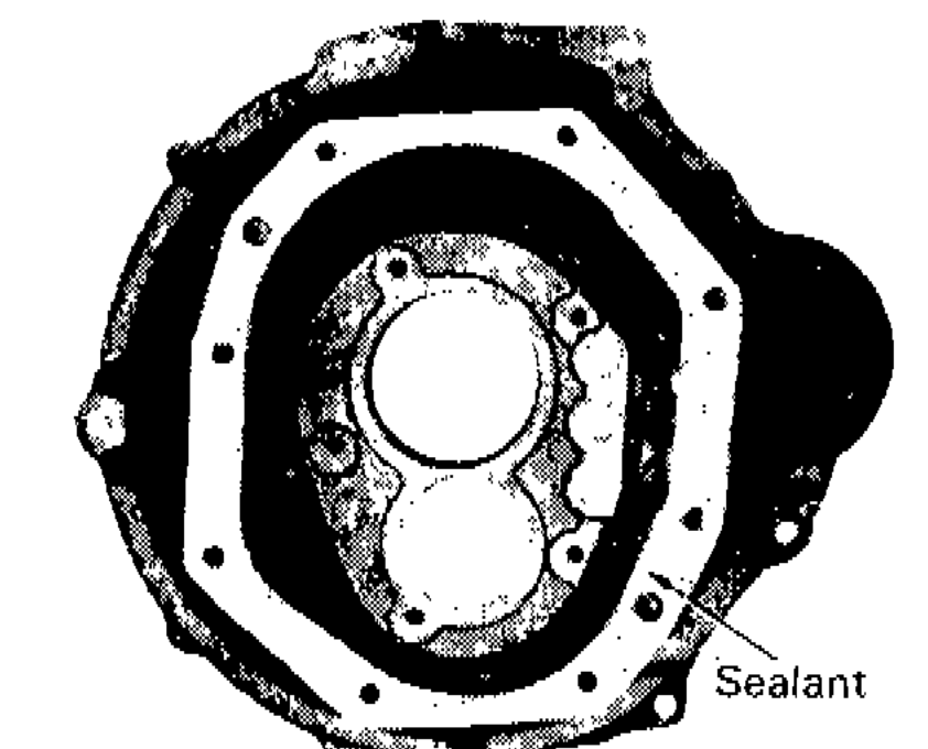 Transmission case mating surface with sealant applied around perimeter
