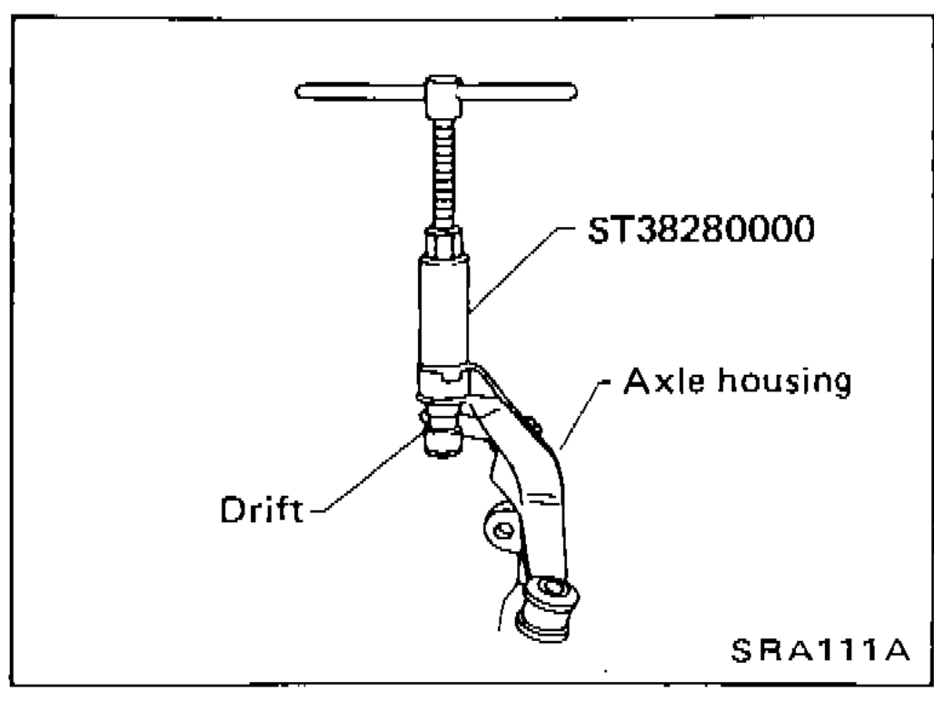 Illustration showing drift attached to outer shell of bushing on axle housing with arm bushing remover (ST38280000) being used to remove bushing.