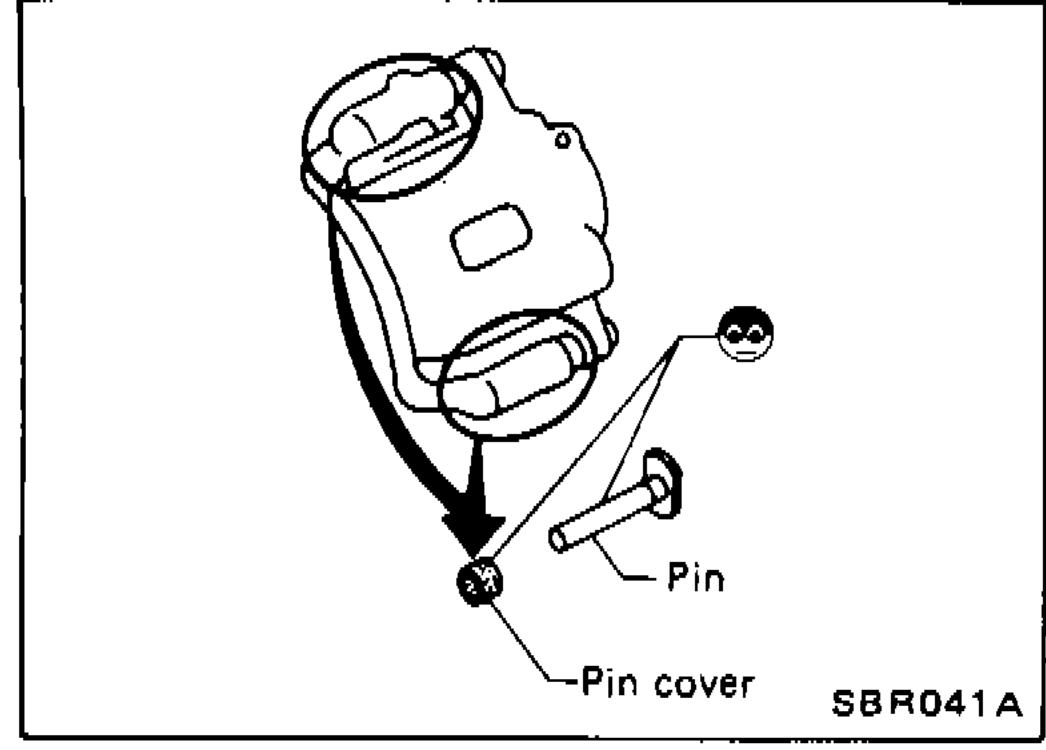 Spring scale being pulled tangentially on the rear-rotor edge with caliper installed, pads in place after pump-and-rotate sequence to measure F₂.