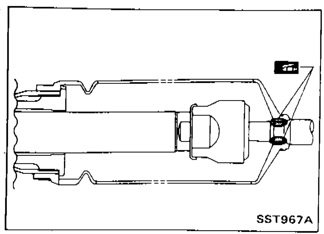 Boot installed onto tie-rod with grease point arrow indicating boot-to-tie-rod contact area lubrication.