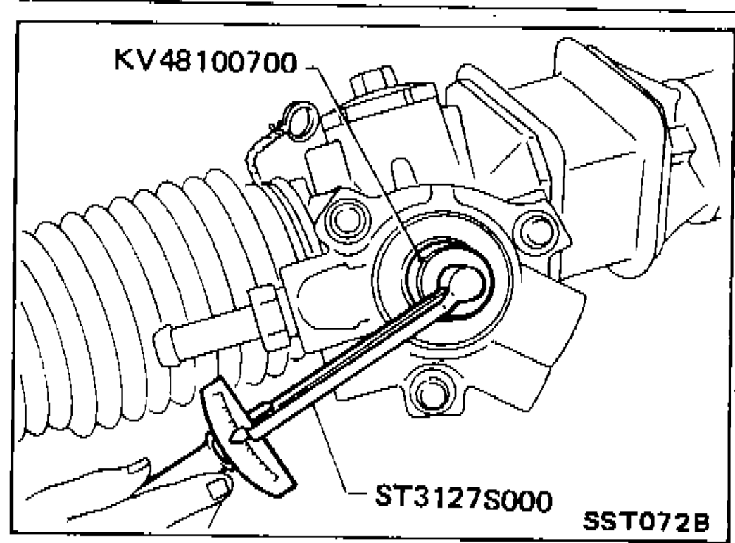 KV48100700 torque adapter on pinion shaft with ST3127S000 torque wrench measuring pinion rotating torque.