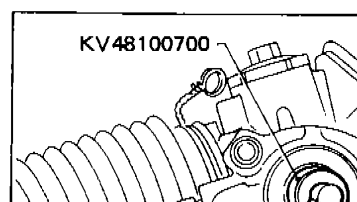 Spring scale hooked into the rack-end loop measuring sliding frictional force on the rack.